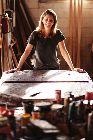 Artist at screen printing table